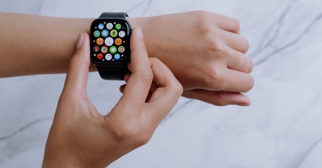 Close-up of hands interacting with a smartwatch on a marble surface, embodying modern digital connectivity.