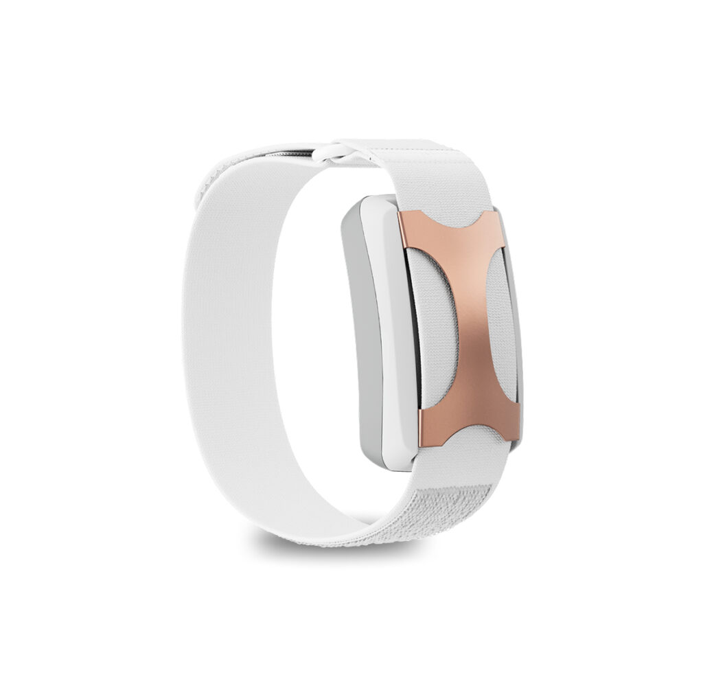 Apollo Neuro wearable device in Rose color , showing the two control buttons for manual haptic biofeedback